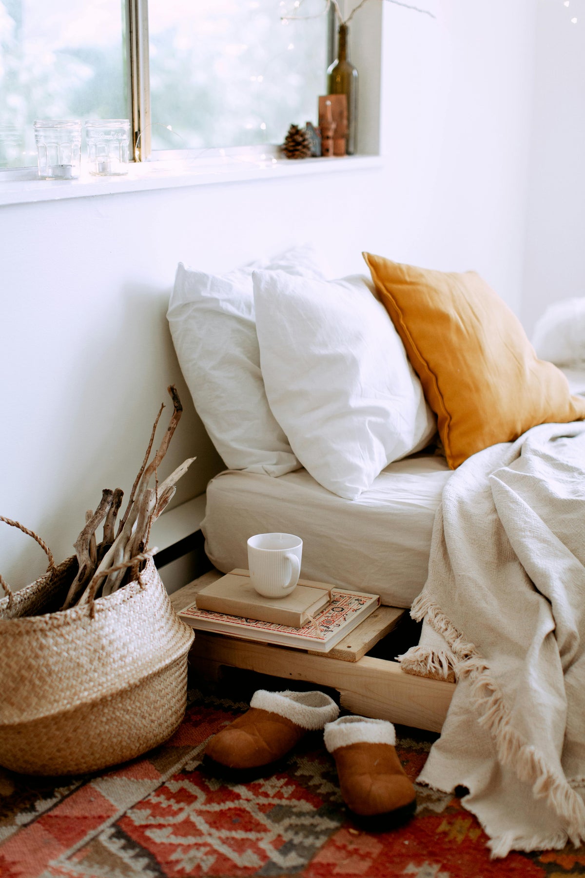Three pillows on a bed
